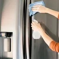 cleaning outside fridge