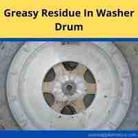 greasy residue in washer drum